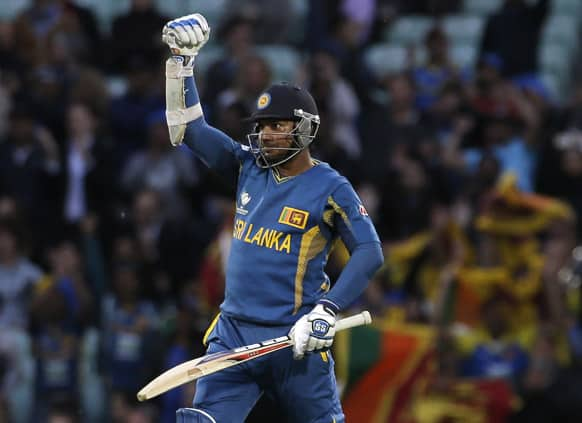 Sri Lanka's Kumar Sangakkara punches the air after he hit the winning runs to defeat England in their ICC Champions Trophy cricket match at the Oval cricket ground in London. Kumar Sangakkara hit an unbeaten 134 not out in the match.