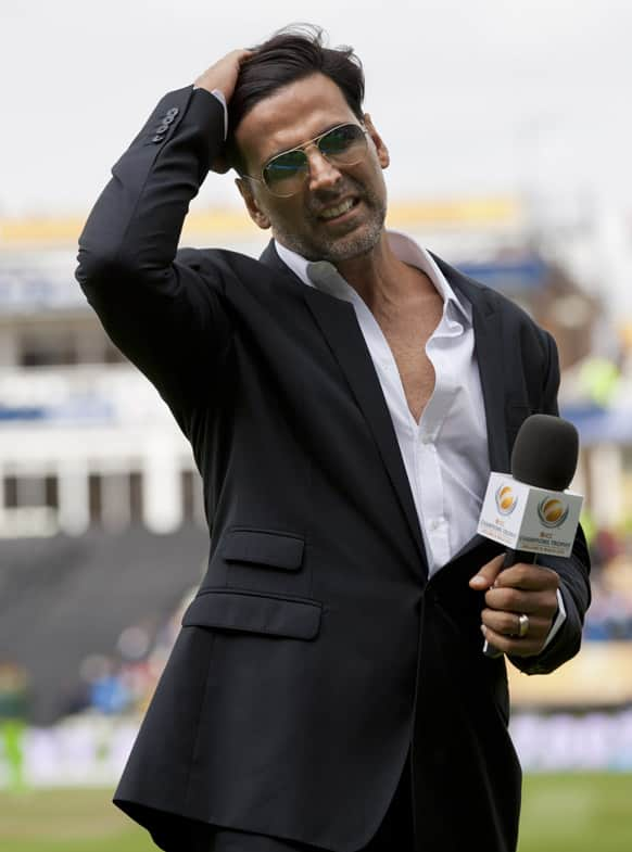 Akshay Kumar waits to be interviewed during India's ICC Champions Trophy cricket match against Pakistan at Edgbaston cricket ground.