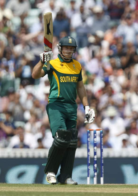 South Africa's David Miller reacts to reaching his 50 runs against England during their ICC Champions Trophy semifinal cricket match at the Oval cricket ground in London.