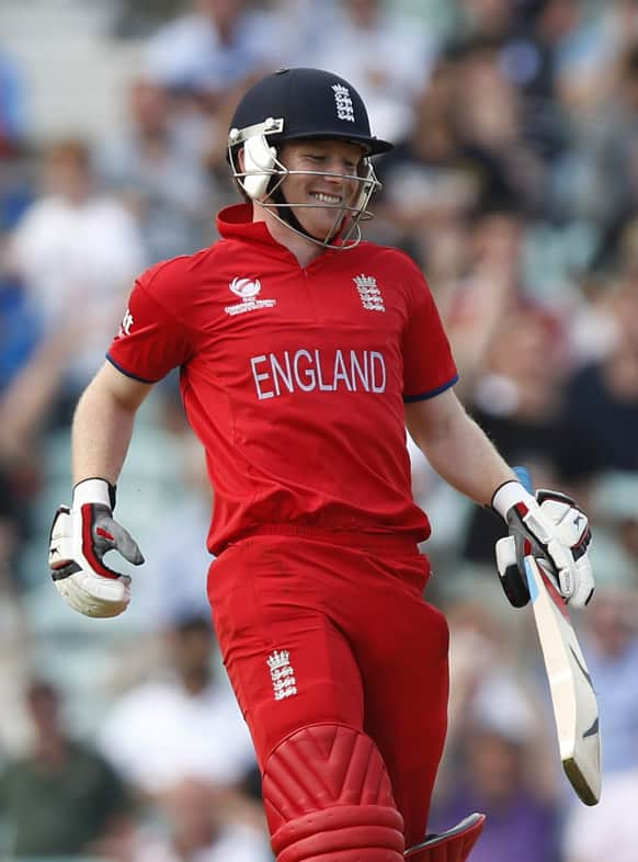 England's Eoin Morgan reacts to their win against South Africa at the end of their ICC Champions Trophy semifinal cricket match at the Oval cricket ground in London.