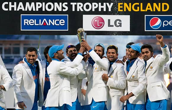 India's players celebrate winning the ICC Champions Trophy Final cricket match after beating England at Edgbaston cricket ground, Birmingham.