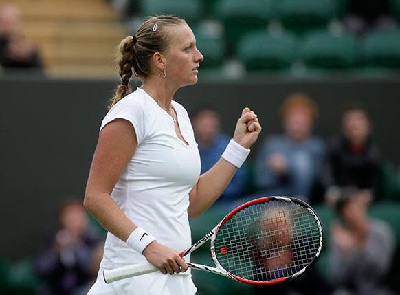 Petra Kvitova of the Czech Republic reacts after winning her match against Coco Vandeweghe of the United States during their Women's first round singles match at the All England Lawn Tennis Championships in Wimbledon.