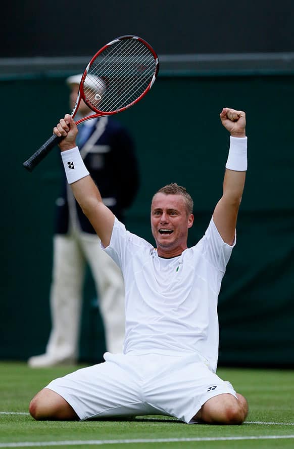 Lleyton Hewitt of Australia reacts as he beats Stanislas Wawrinka of Switzerland during their Men's first round singles match at the All England Lawn Tennis Championships in Wimbledon.