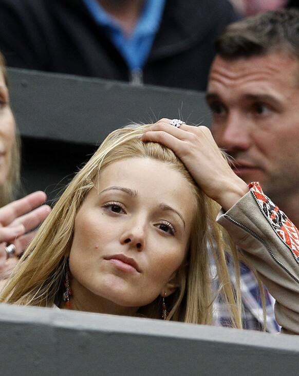 Jelena Ristic, the girlfriend of Serbia's Novak Djokovic, watches his Men's second round singles match against Bobby Reynolds of the United States at the All England Lawn Tennis Championships in Wimbledon.