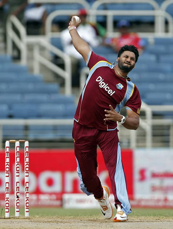 West Indies' Ravi Rampaul bowls during the Tri-Nation Series cricket match against Sri Lanka in Kingston, Jamaica.