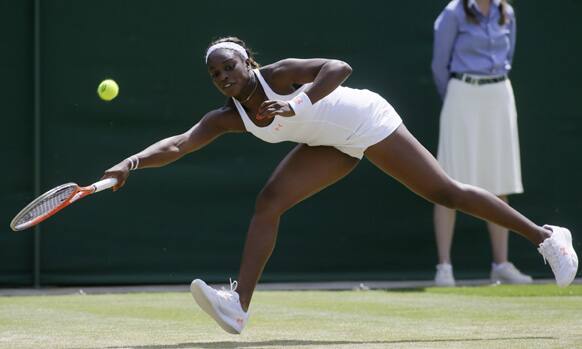 Sloane Stephens of the United States plays a shot to Petra Cetkovska of the Czech Republic in their Women's singles match at the All England Lawn Tennis Championships in Wimbledon, London.