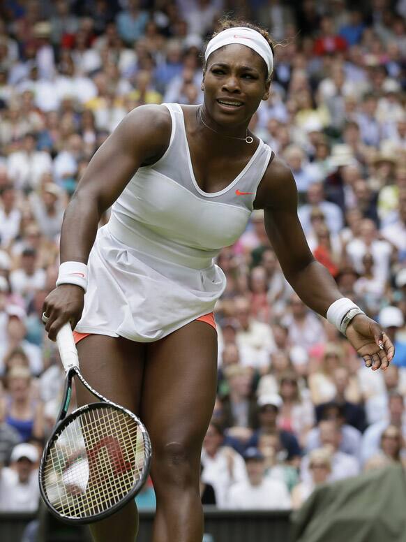 Serena Williams of the United States reacts as she plays Sabine Lisicki of Germany in a Women's singles match at the All England Lawn Tennis Championships in Wimbledon.