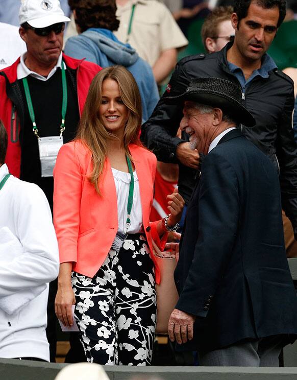 Kim Sears, the girlfriend of Andy Murray of Britain, arrives on Centre Court for his match against Fernando Verdasco of Spain at the All England Lawn Tennis Championships in Wimbledon.