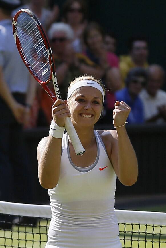 Sabine Lisicki of Germany reacts after defeating Agnieszka Radwanska of Poland in their Women's singles semifinal match at the All England Lawn Tennis Championships in Wimbledon.