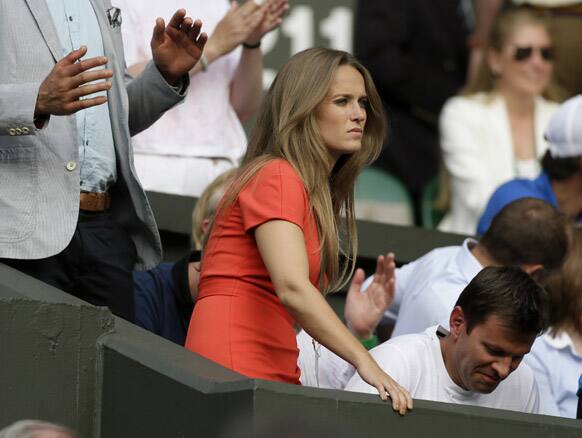 Kim Sears, the girlfriend of Andy Murray of Britain watches as he faces Jerzy Janowicz of Poland in their Men's singles semifinal match at the All England Lawn Tennis Championships in Wimbledon.