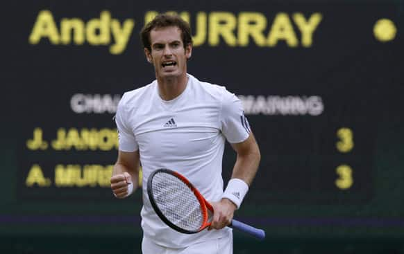 Andy Murray of Britain reacts during his Men's singles semifinal match against Jerzy Janowicz of Poland at the All England Lawn Tennis Championships in Wimbledon.