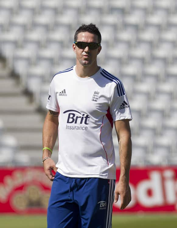 England's Kevin Pietersen walks across the pitch at nets practice the day before the side's opening Ashes cricket match against Australia at Trent Bridge cricket ground, Nottingham.