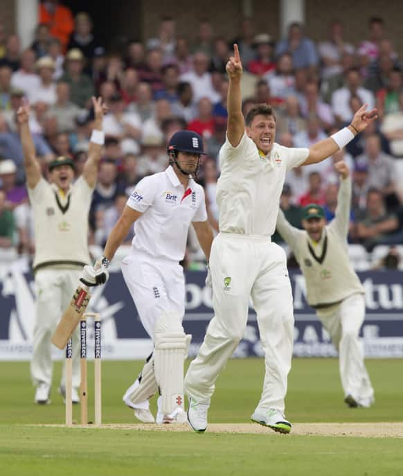 Australia's James Pattinson celebrates taking the wicket of England captain Alastair Cook, for 13 on the first day of the opening Ashes series cricket match against at Trent Bridge cricket ground, Nottingham, England.