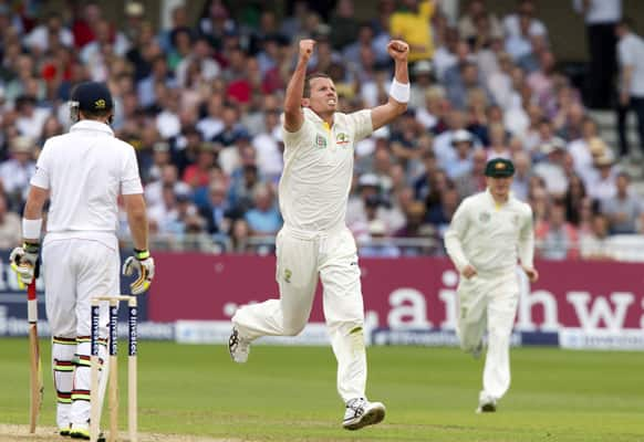 Australia's Peter Siddle celebrates after taking the wicket of England's Ian Bell for 25 caught by Shane Watson on the first day of the opening Ashes series cricket match at Trent Bridge cricket ground, Nottingham, England.