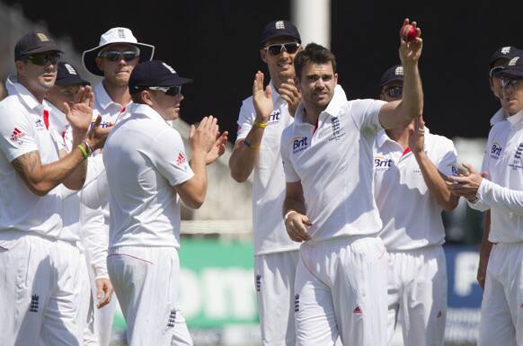 England's James Anderson celebrates after taking his 5th wicket on the second day of the opening Ashes series cricket match against Australia at Trent Bridge cricket ground, Nottingham, England.