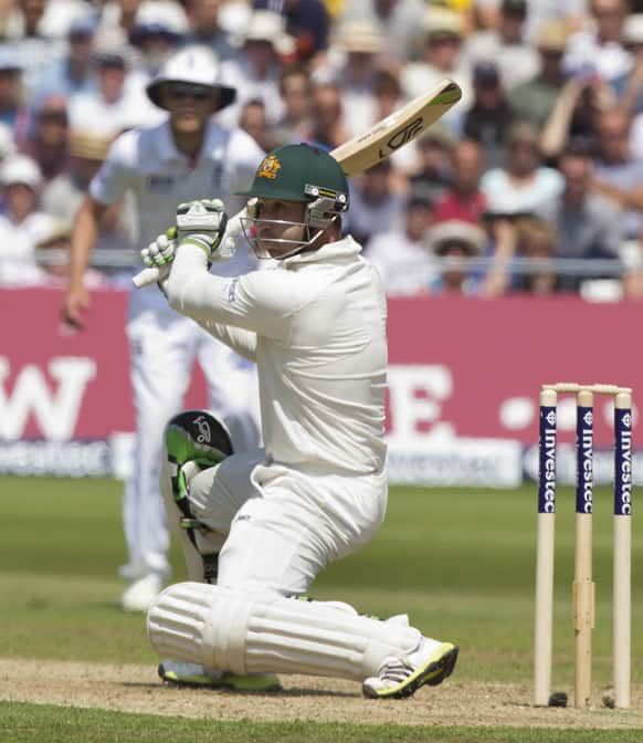 Australia's Phillip Hughes plays a shot off the bowling of England's Steven Finn on the second day of the opening Ashes series cricket match at Trent Bridge cricket ground, Nottingham, England.