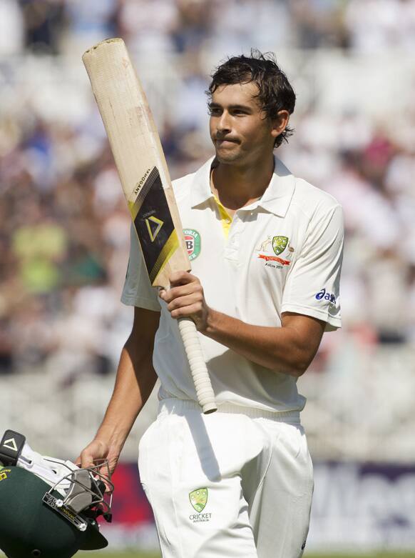 Australia's Ashton Agar salutes the crowd after scoring a record 98 runs on the second day of the opening Ashes series cricket match against England at Trent Bridge cricket ground, Nottingham, England.