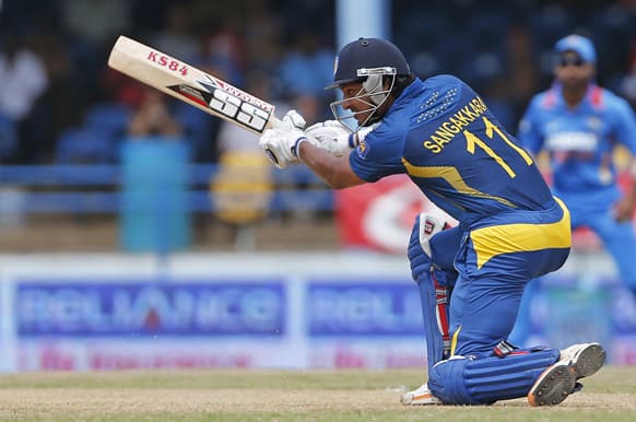 Sri Lanka's Kumar Sangakkara plays a shot off India's Bhuvneshwar Kumar during the final match of the Tri-Nation cricket series in Port-of-Spain, Trinidad.