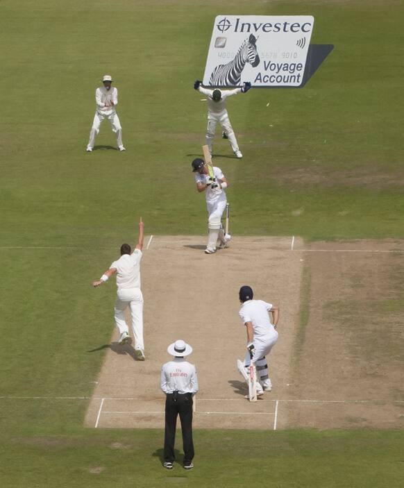 Australia's James Pattinson celebrates after bowling England's Kevin Pietersen for 64 on the third day of the opening Ashes series cricket match at Trent Bridge cricket ground, Nottingham, England.