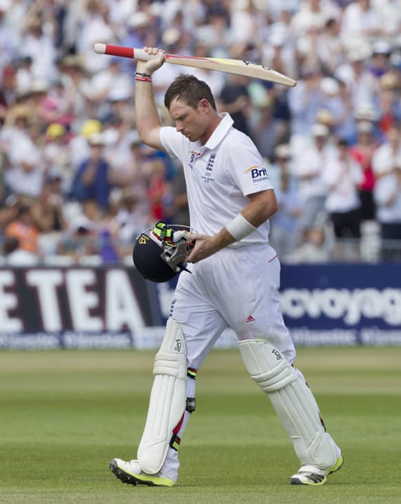 England's Ian Bell a salutes the crowd as he makes his way back to the dressing room after losing his wicket, caught on 109 by Australia's Brad Haddin off the bowling of Mitchell Starc on the fourth day of the opening Ashes series cricket match at Trent Bridge cricket ground, Nottingham.