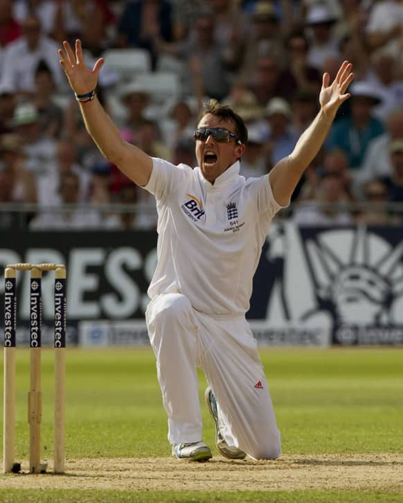 England's Graeme Swann appeals as he takes the wicket of Australia's Steve Smith, LBW for 17 on the fourth day of the opening Ashes series cricket match at Trent Bridge cricket ground, Nottingham.