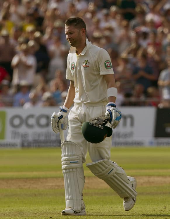 Australia's captain Michael Clarke walks from the pitch after losing his wicket for 23, caught by England's Matt Prior off the bowling of Stuart Broad on the fourth day of the opening Ashes series cricket match at Trent Bridge cricket ground.