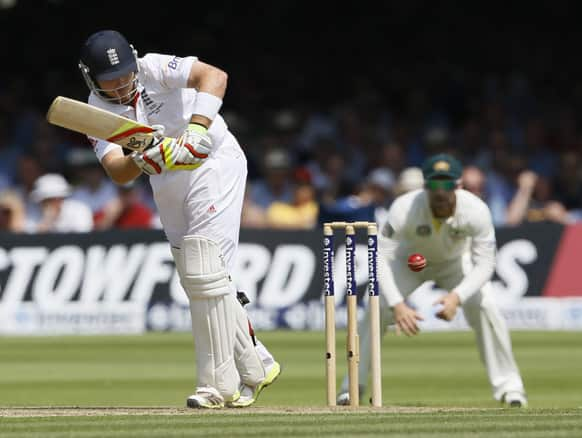 England's Ian Bell plays a shot off the bowling of Australia's Ryan Harris during the Ashes test at Lord's cricket ground in London.