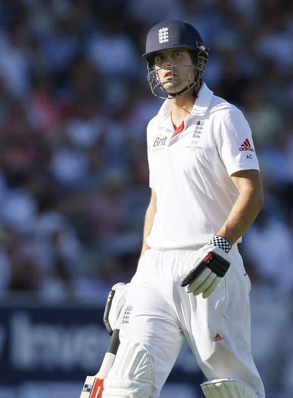 England's Alastair Cook leaves the pitch after being bowled by Australia's Peter Siddle during day two of the second Ashes Test match held at Lord's cricket ground in London.