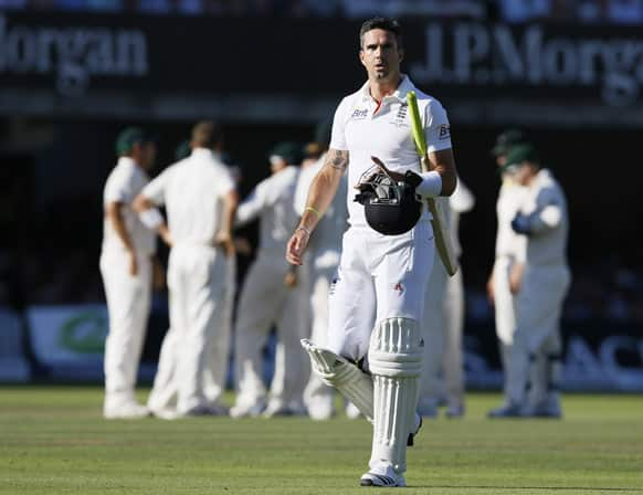 England's Kevin Pietersen leaves the pitch after being caught off the bowling of Australia's Peter Siddle during day two of the second Ashes Test match held at Lord's cricket ground in London.