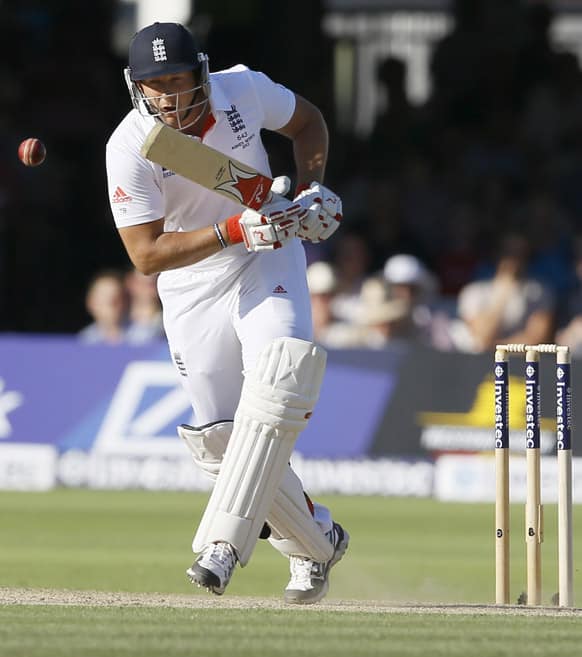 England's Tim Bresnan plays a shot off the bowling of Australia's Ryan Harris during day two of the second Ashes Test match held at Lord's cricket ground in London.