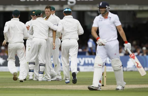 England's Tim Bresnan leaves the pitch after being caught off the bowling of Australia's James Pattinson during day three of the second Ashes Test match held at Lord's cricket ground in London.