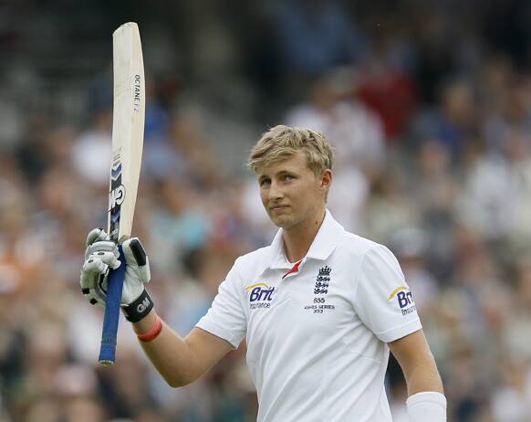 England's Joe Root leaves the pitch on 180 runs after being caught off the bowling of Australia's Ryan Harris during day four of the second Ashes Test match at Lord's cricket ground in London.