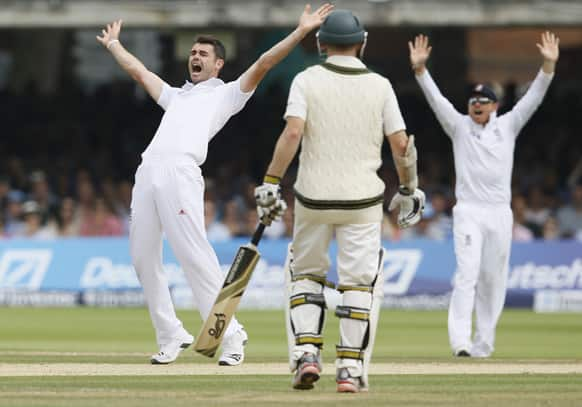 England's James Anderson, left, appeals successfully the LBW of Australia's Shane Watson during day four of the second Ashes Test match held at Lord's cricket ground in London.