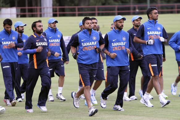 Indian Cricket players are seen during a practice session in Harare.