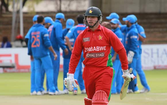 Zimbabwean batsman Brendan Taylor walks off the pitch after been dismissed for a duck during the last day of the one day international cricket game against India at Queens Sports Club in Bulawayo, Zimbabwe.