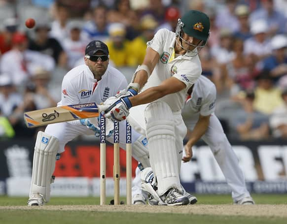 Australia's Mitchell Starc plays a shot off the bowling of England's Joe Root during day two of the third Ashes Test match held at Old Trafford cricket ground in Manchester, England.