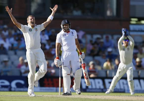 Australia's Peter Siddle celebrates the wicket of England's Tim Bresnan caught by Brad Haddin during day two of the third Ashes Test match held at Old Trafford cricket ground in Manchester, England.