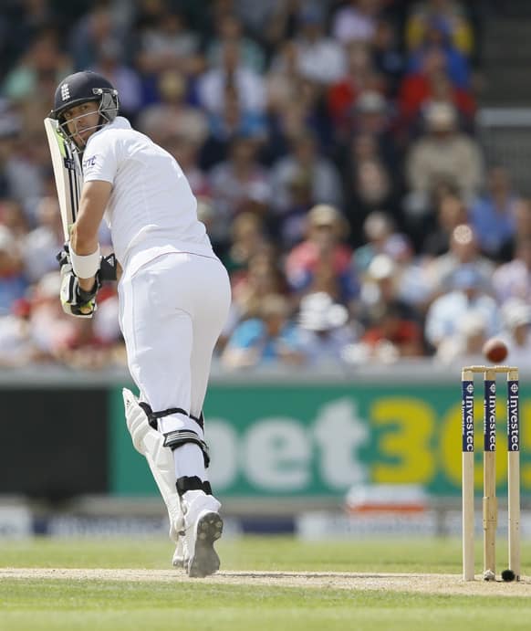 England's Kevin Pietersen plays a shot off the bowling of Australia's Peter Siddle during day three of the third Ashes Test match held at Old Trafford cricket ground in Manchester, England.