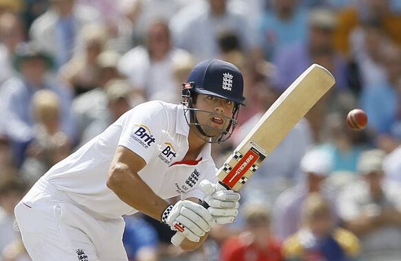 England's Alastair Cook plays a shot off the bowling of Australia's Shane Watson during day three of the third Ashes Test match held at Old Trafford cricket ground in Manchester, England.