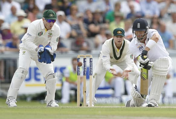 England's Kevin Pietersen plays a shot off the bowling of Australia's Nathan Lyon during day three of the third Ashes Test match held at Old Trafford cricket ground in Manchester, England.