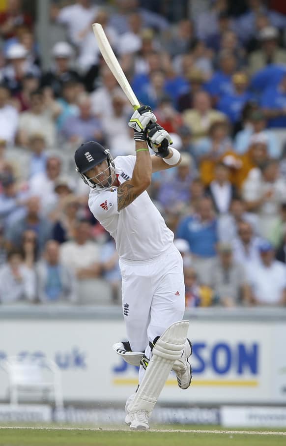 England's Kevin Pietersen plays a shot off the bowling of Australia's Nathan Lyon during day three of the third Ashes Test match held at Old Trafford cricket ground in Manchester, England.