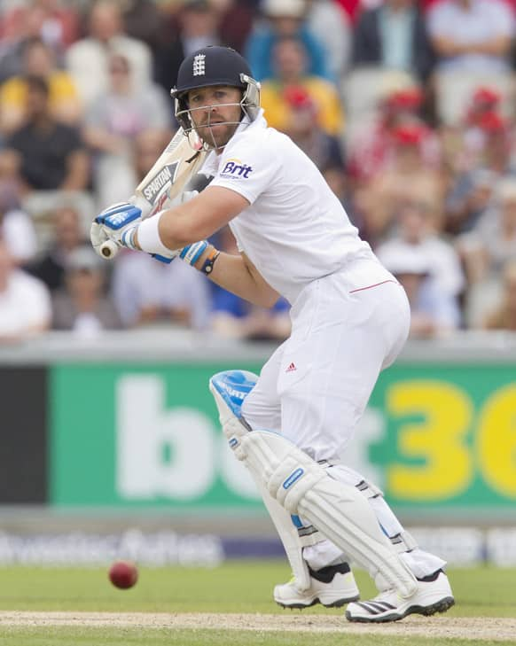 England's Matt Prior plays a shot off the bowling of Australia's Peter Siddle on the fourth day of the third Ashes Test series cricket match at Old Trafford cricket ground, Manchester, England.