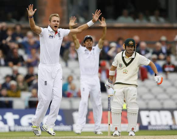 England's Stuart Broad, left, appeals unsuccessfully the wicket of Australia's David Warner, right, during day four of the third Ashes Test match held at Old Trafford cricket ground in Manchester.