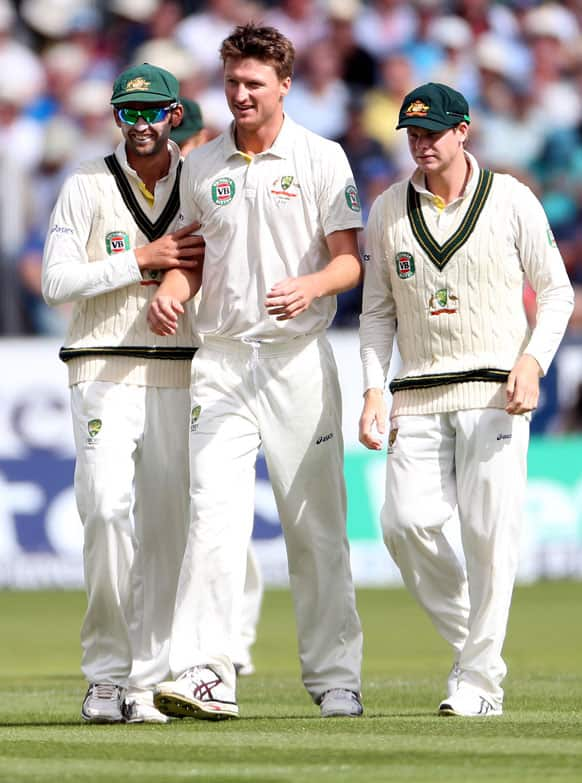 Australia's Jackson Bird, center, celebrates after bowling out England's James Anderson during the second day of the fourth Ashes series cricket match at the Riverside cricket ground, Chester-le-Street, England.