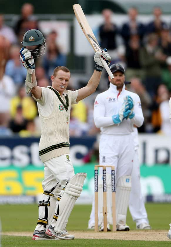 Australia's Chris Rogers celebrates scoring 100 during the second day of the fourth Ashes series cricket match against England at the Riverside cricket ground, Chester-le-Street, England.