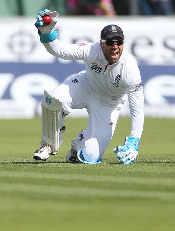 England's Matt Prior celebrates after catching Australia's Chris Rogers during the third day of the fourth Ashes series cricket match against England at the Riverside cricket ground, Chester-le-Street, England.