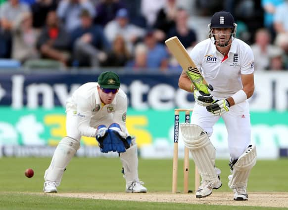 England's Kevin Pietersen plays a shot bowled by Australia's Nathan Lyon during the third day of the fourth Ashes series cricket match at the Riverside cricket ground, Chester-le-Street, England.