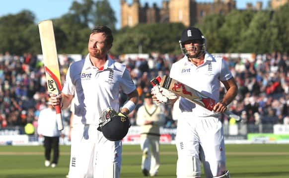 England's Ian Bell, left, walks from the pitch after scoring 105 at the end of play on the third day of the fourth Ashes series cricket match against Australia at the Riverside cricket ground, Chester-le-Street, England.