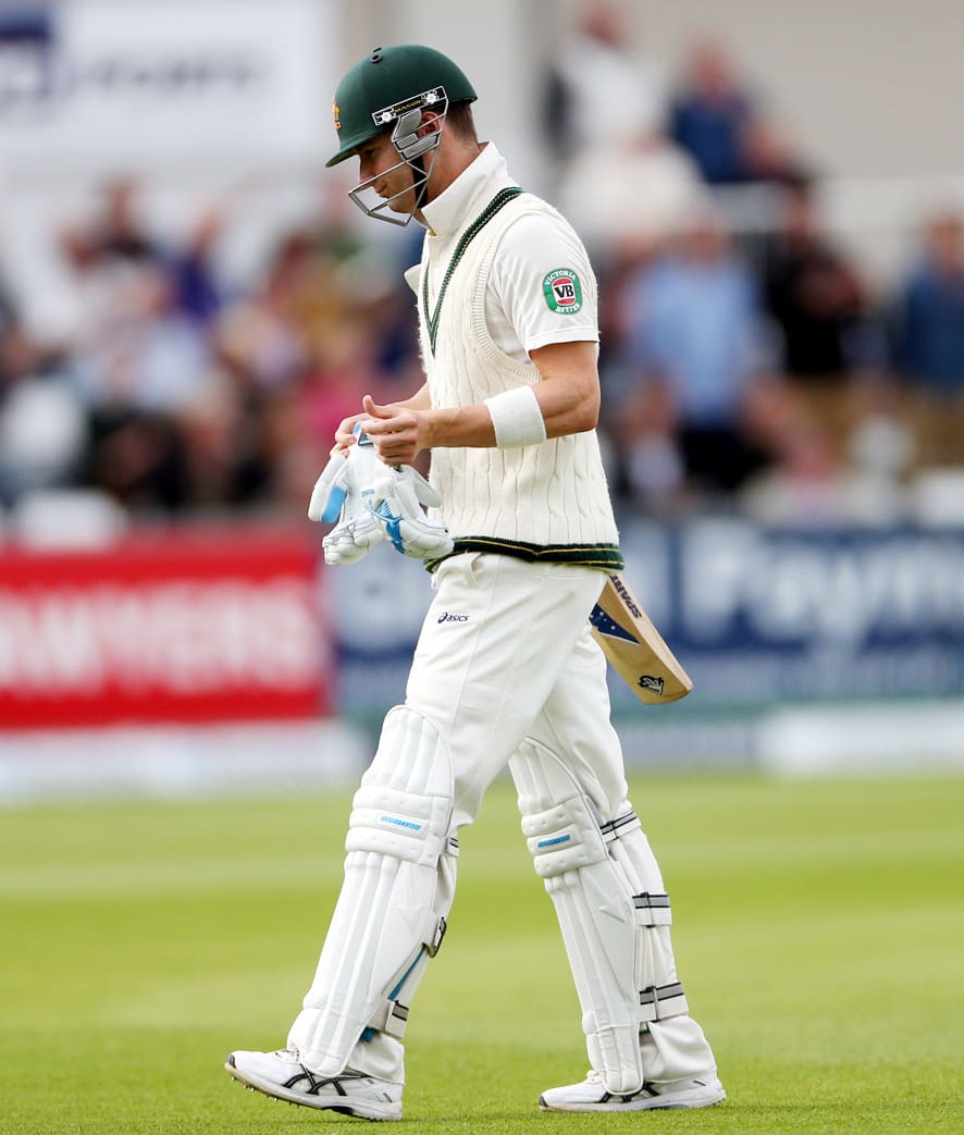 Australia's captain Michael Clarke walks from the pitch after being bowled out by England's Stuart Broad during the fourth day of the fourth Ashes series cricket match at the Riverside cricket ground, Chester-le-Street, England.