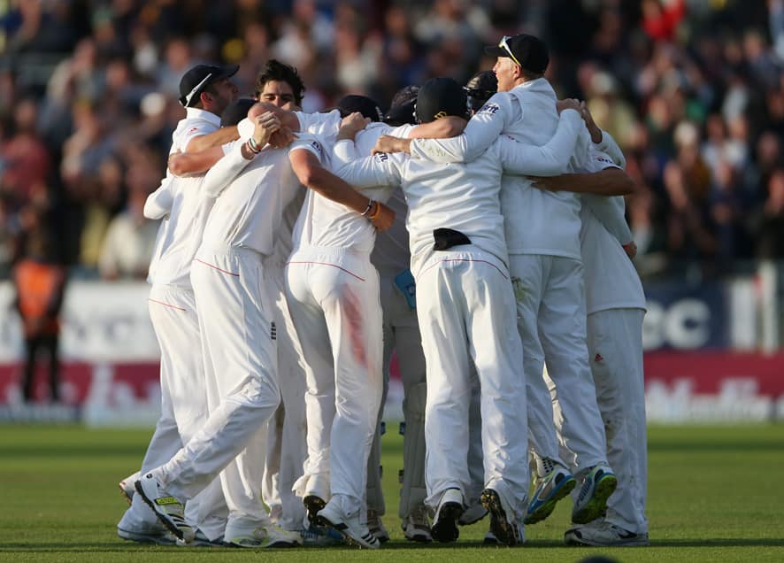 England players celebrate after defeating Australia during the fourth day of the fourth Ashes series cricket match at the Riverside cricket ground, Chester-le-Street, England.